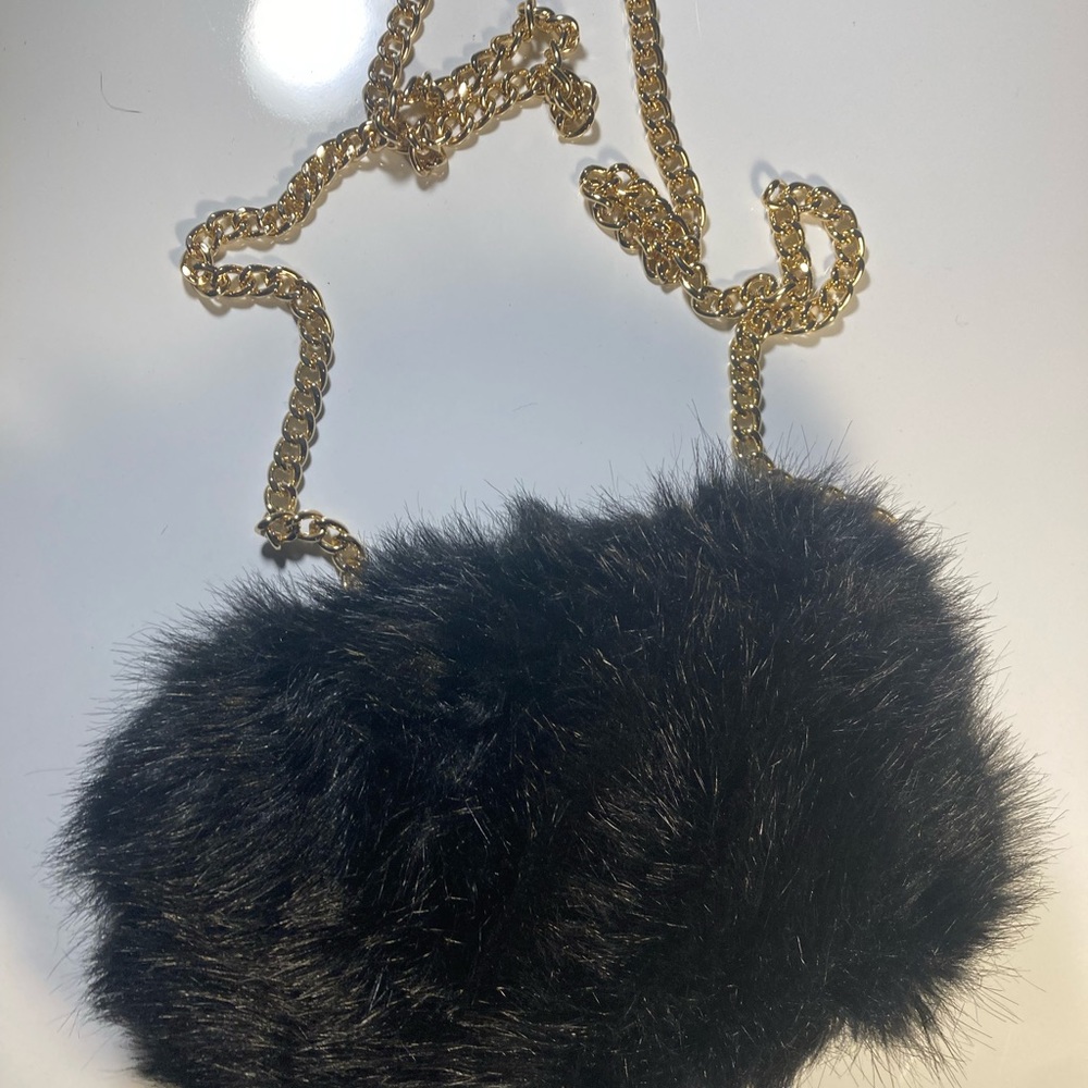 Zara Woman black faux fur convertible clutch shoulder bag with gold chain strap.